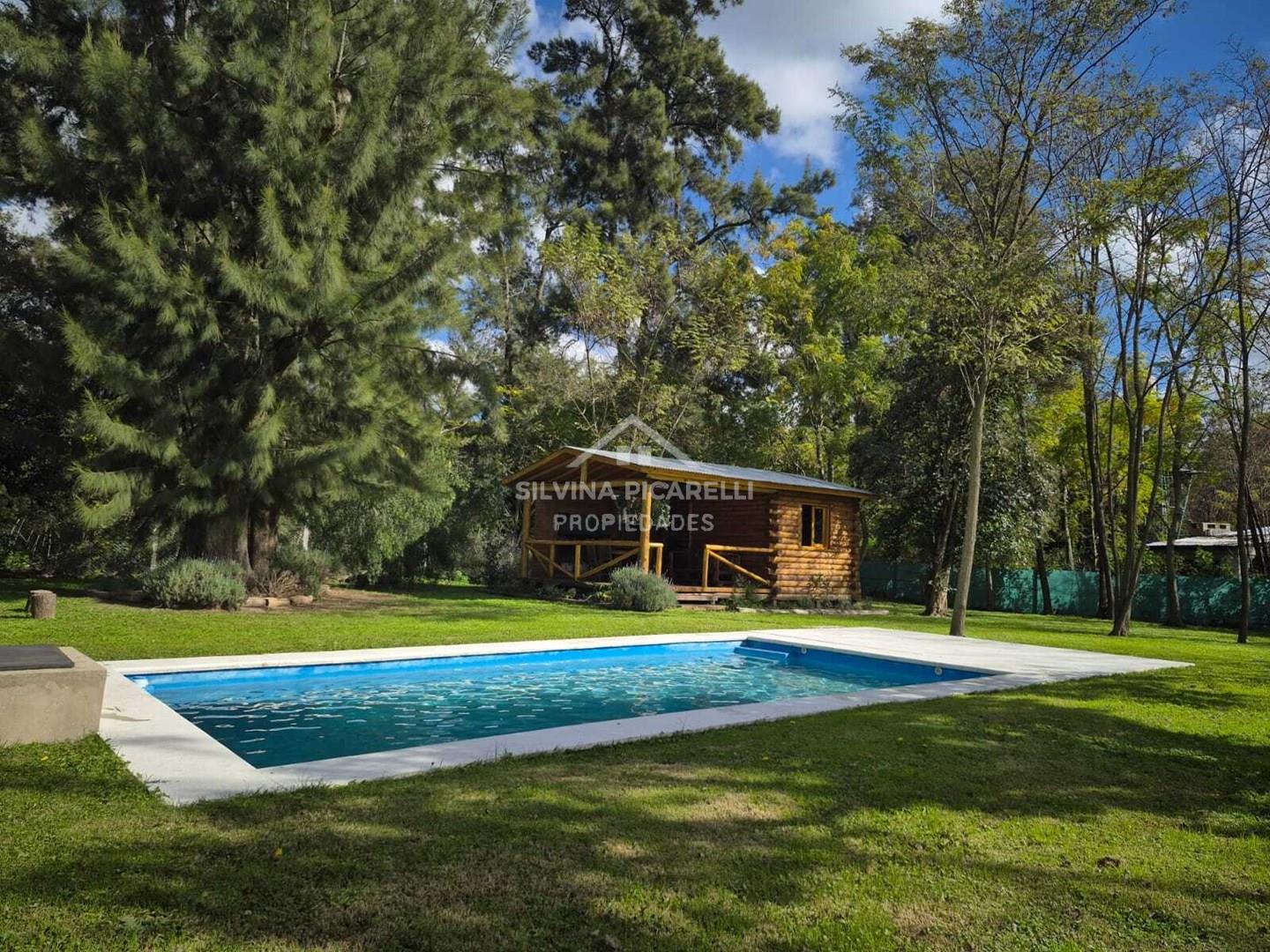 VENTA CABAÑA DE TRONCO CON PILETA BARRIO JURALO Calle OMBU